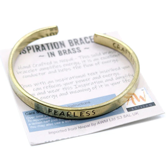 Handcrafted Nepalese brass inspiration bracelet with engraved motivational messages.