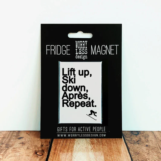 Amusing Ski Lovers Fridge Magnet with "Lift up, ski down" slogan on black backing card.