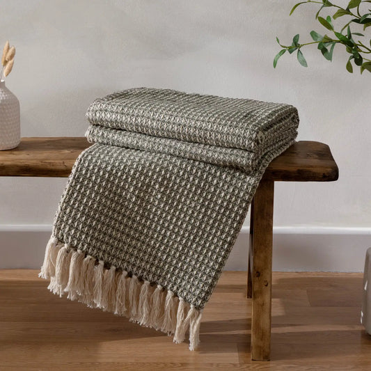 Lorne Throw with two-tone chunky waffle weave, contrasting yarn, and double-sided tasselled fringe, made from soft 100% cotton for stylish comfort.