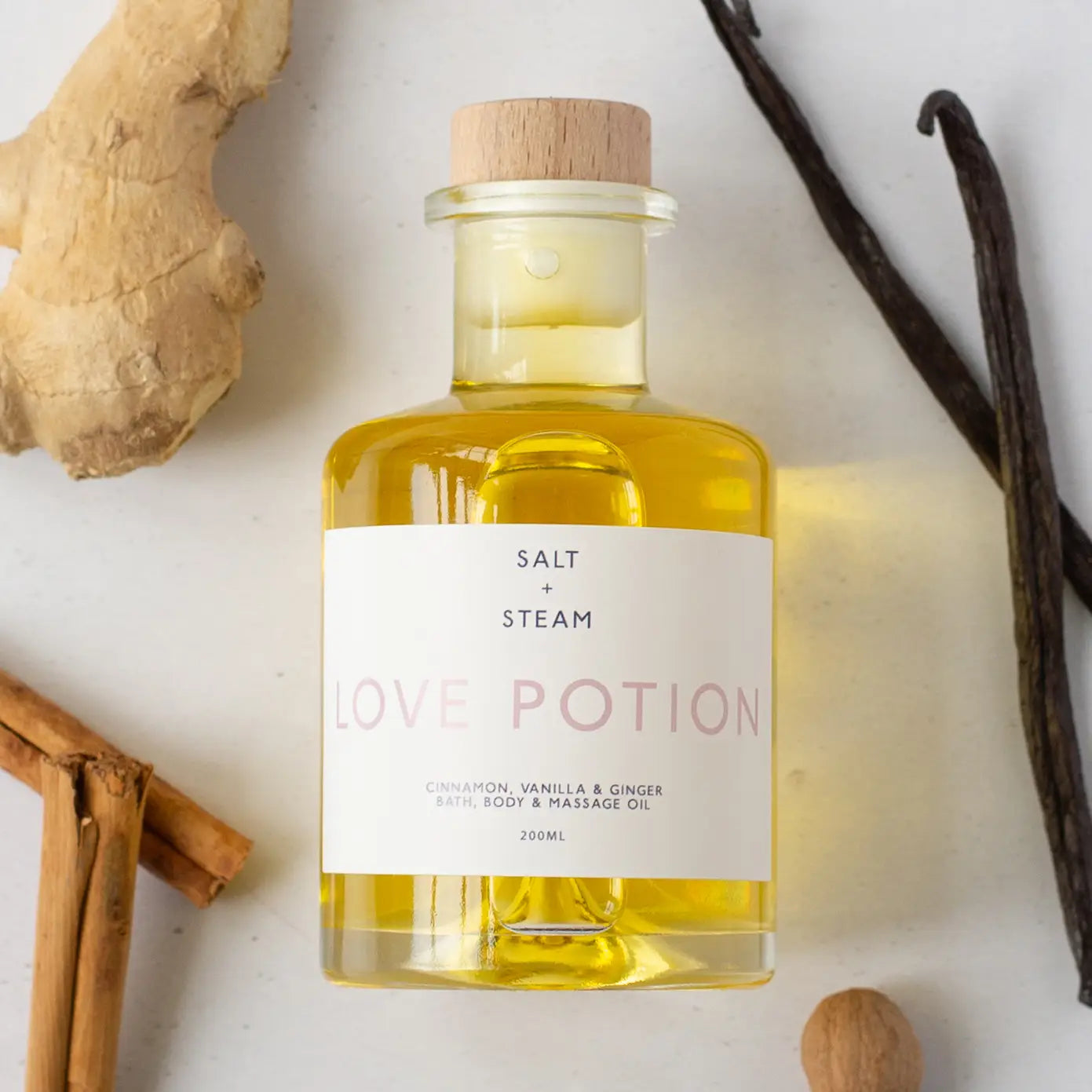 Bottle of 'Love Potion' body, bath, and massage oil 