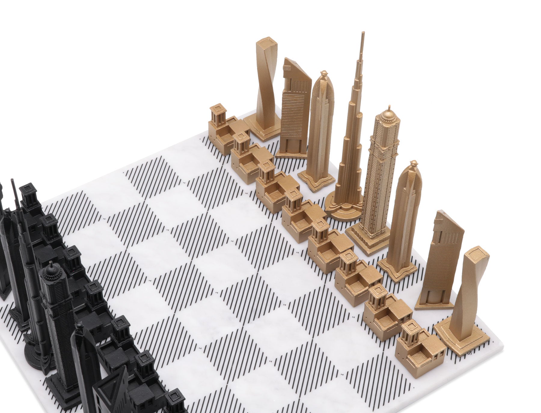 Luxury Bronze Edition Skyline Chess Set with marble board, featuring intricately sculpted bronze chess pieces inspired by iconic city skylines.