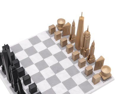 Luxury Bronze Edition Skyline Chess Set with marble board, featuring intricately sculpted bronze chess pieces inspired by iconic city skylines.