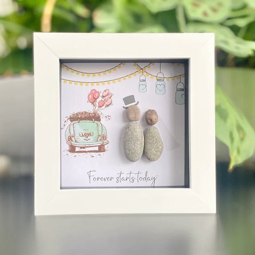 Mini Pebble Artwork Gift in white frame for weddings, featuring unique pebble design with glass front.