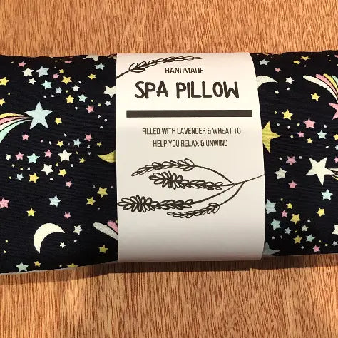 Moon & Stars Heatable Lavender and Wheat Spa Pillow with soothing design for relaxation therapy.