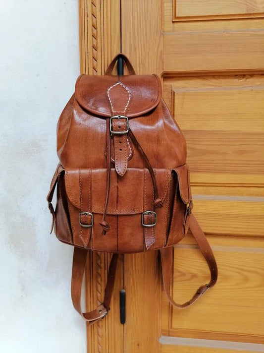 Handmade premium Moroccan brown leather backpack with elegant craftsmanship.