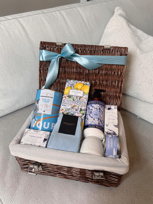 Moving out gift box for her with candle, socks, wax melts and home essentials