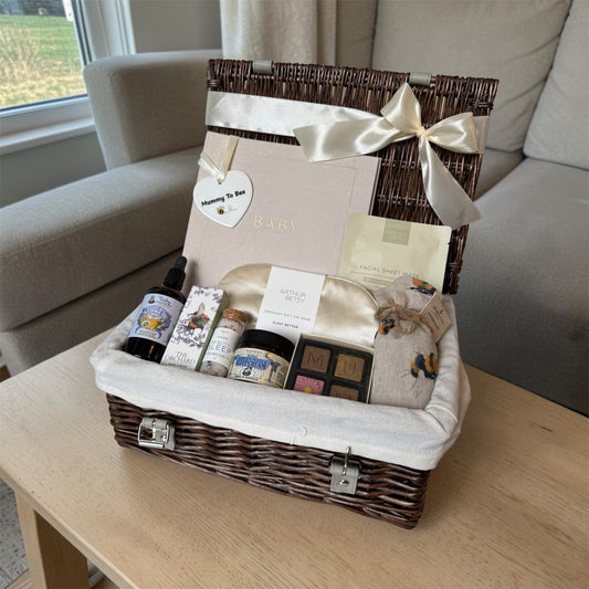 Mummy To Bee pregnancy pamper hamper with skincare, sleep mask, belly oil, chocolates, lavender sachet and keepsake sign for mums to be.