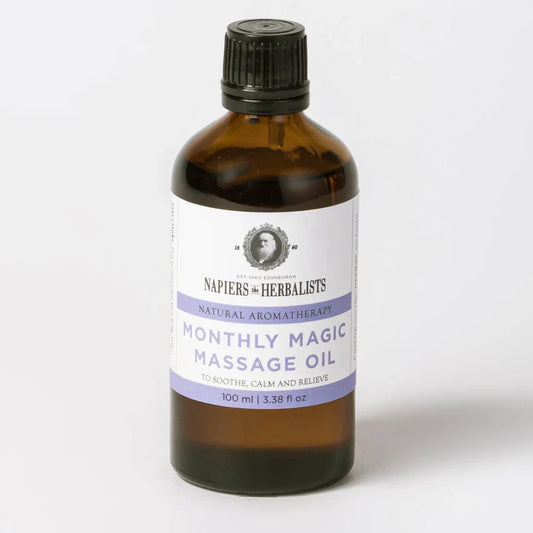 Relaxing & Calming Massage Oil in amber bottle for soothing period discomfort.