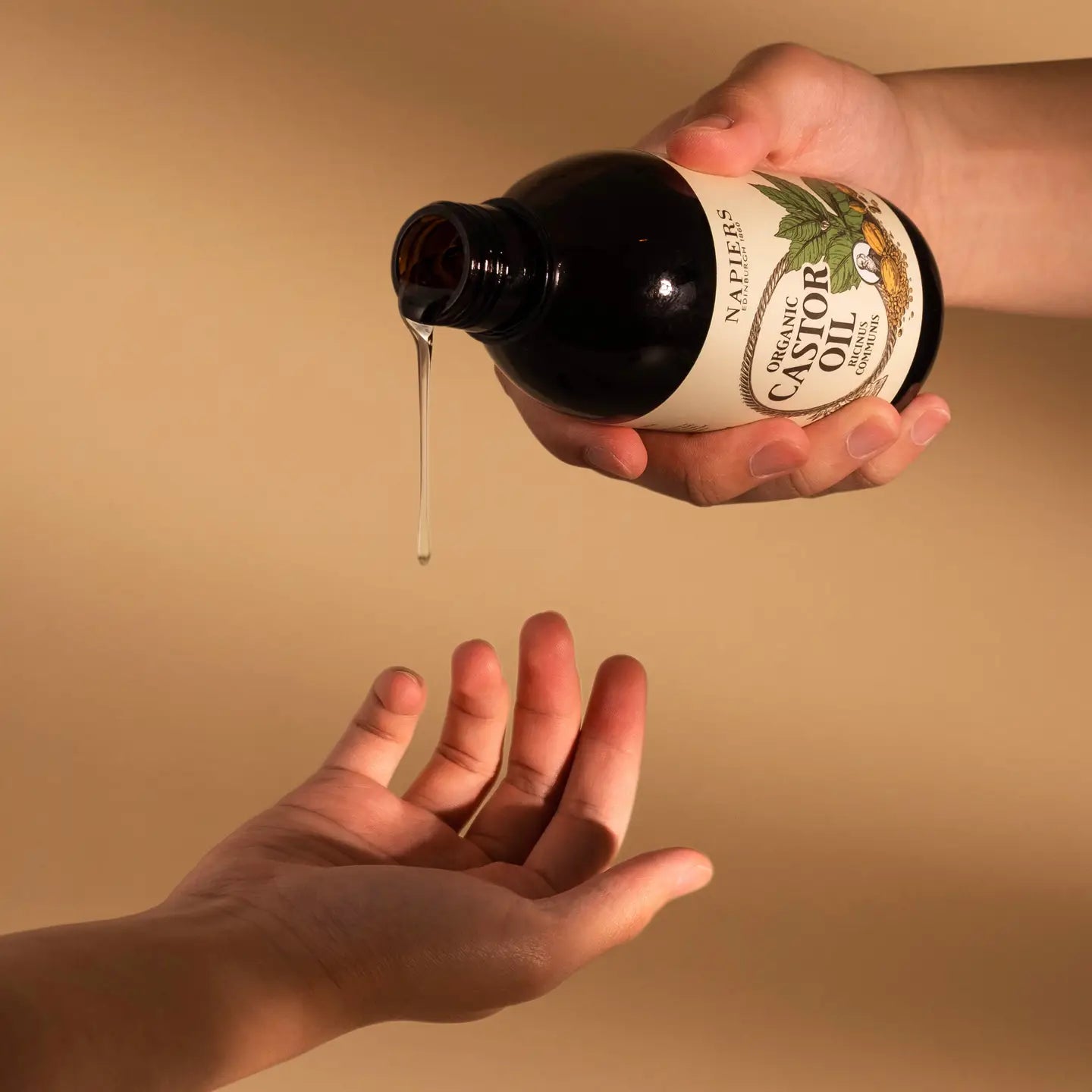 Napiers fresh-pressed organic castor oil cold-pressed and unrefined for skin, hair, eyelashes and eyebrows