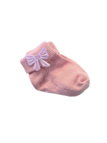 Organic cotton newborn socks with cute bow In pink.