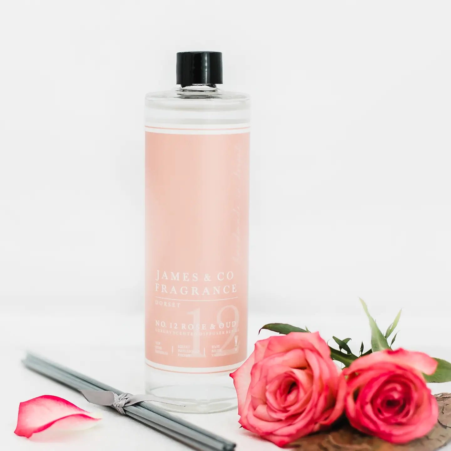 James & Co Rose and Oud luxury scented diffuser refill with grey reeds in 200ml bottle.