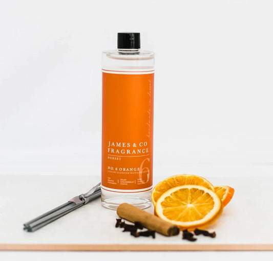 Sweet & Fragrant Orange Reed Diffuser Refill 200ml with cinnamon and clove, featuring grey reeds for a warm cozy scent.