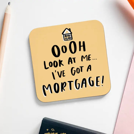 Humorous "Ooh Look At Me I've Got A Mortgage" coaster for new homeowners.