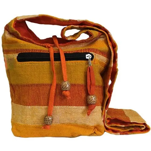 Vibrant orange Nepal sling bag with multiple pockets and wide strap.