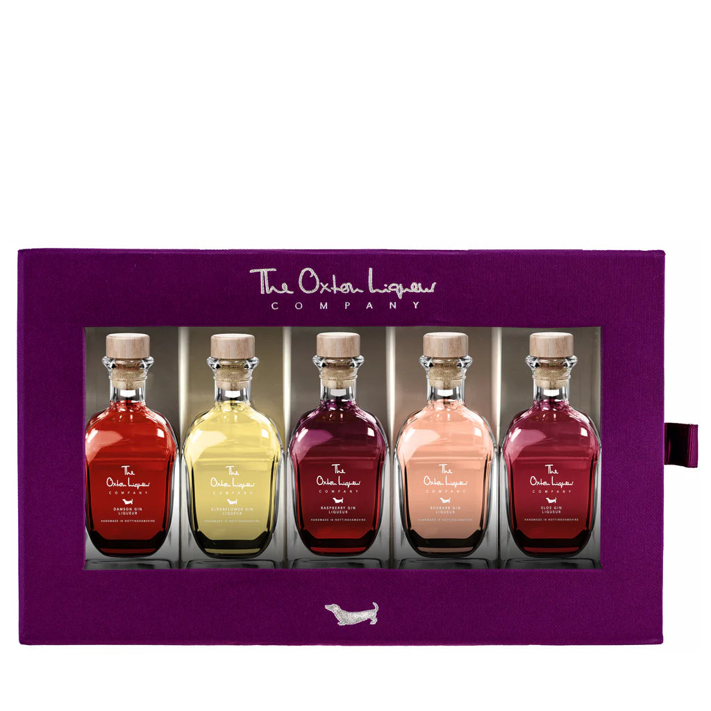 Oxton Liqueurs Miniature Bauble Gift Box featuring festive bauble-shaped bottles filled with assorted liqueurs, beautifully packaged for holiday gifting.