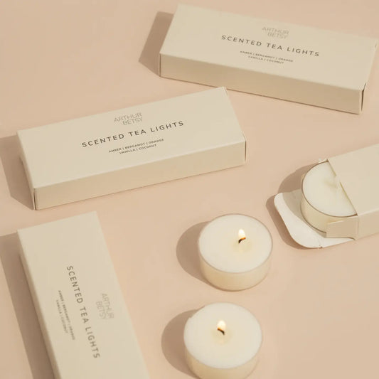Amber, Bergamot, Orange, Vanilla & Coconut scented tea light candle set. 