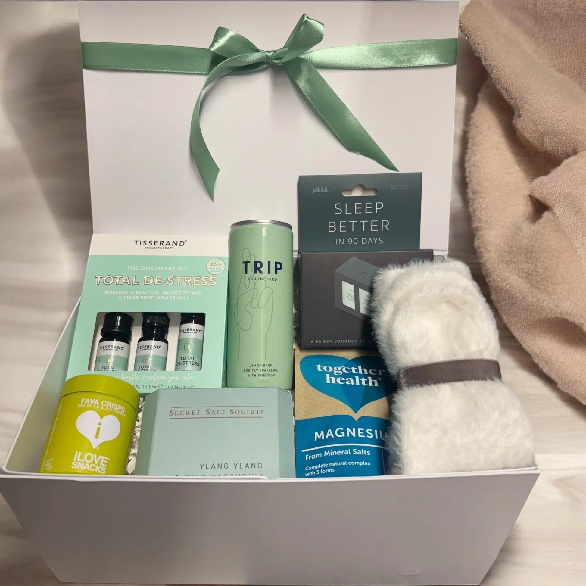 Wellness Box for Her with relaxation items and self-care products.