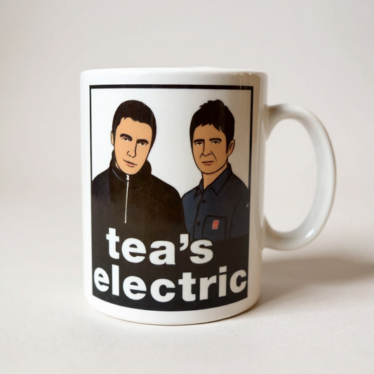 Mug with illustrations of two people and the text 'tea's electric' on a white background