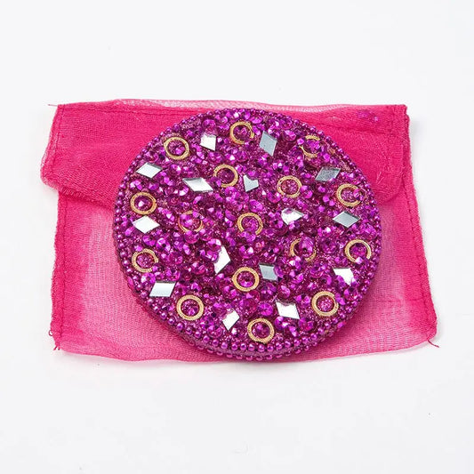 Pink mosaic handbag mirror with pink sequins and gold rings.