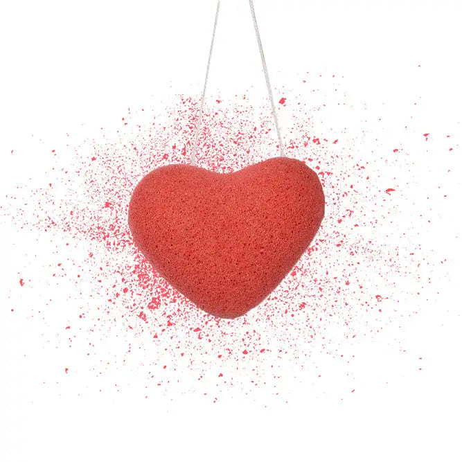 Pink heart-shaped Konjac sponge for sensitive skin cleansing.