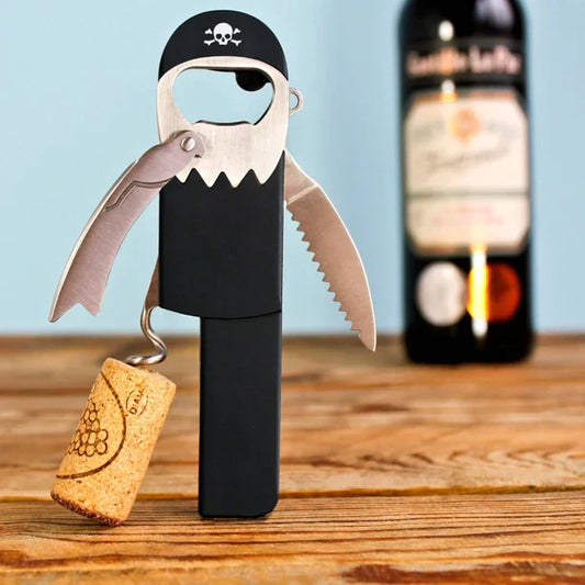 Novelty pirate-shaped bottle opener with corkscrew and foil cutter.