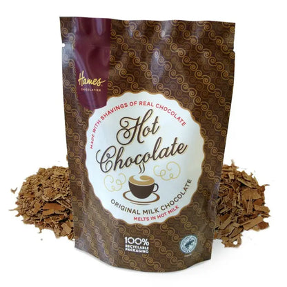 Luxury Real Milk Hot Chocolate Pouch with genuine milk chocolate shavings, offering a creamy hot chocolate experience.