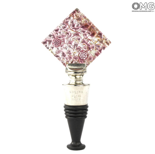Bottle stopper handmade with pink Murano glass and blue millefiori design.