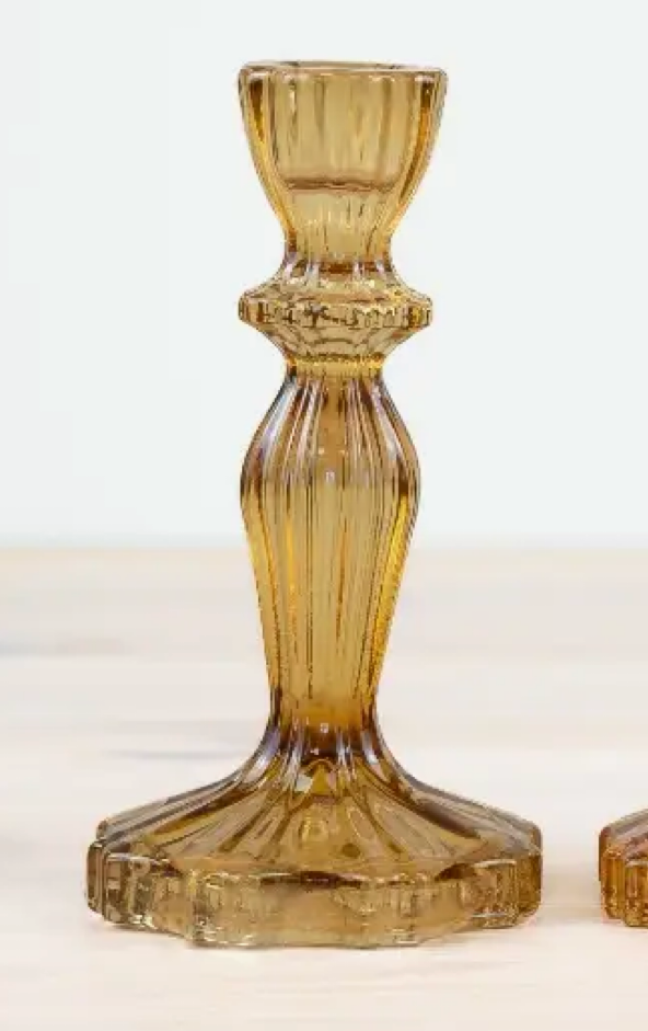 Amber glass candle holder with tapered design, 15.8cm.