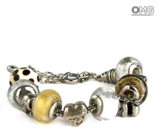 White bracelet with handmade Murano glass beads and metal figures on chrome chain.