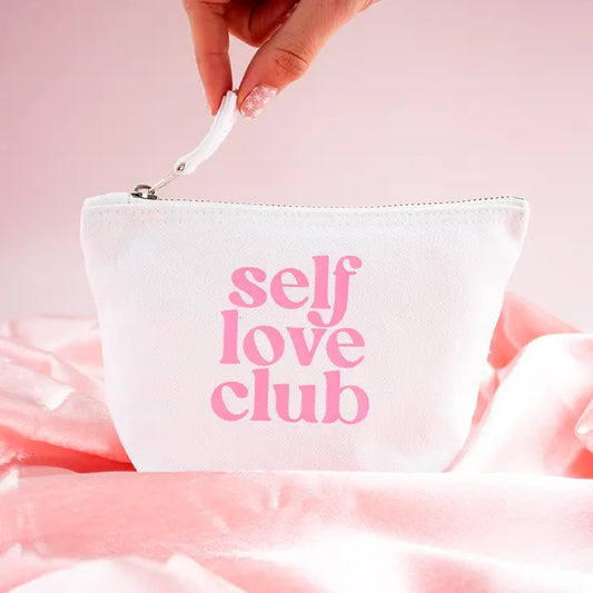 Make up pouch with "Self Love Club" text on organic cotton canvas, ideal for essentials.