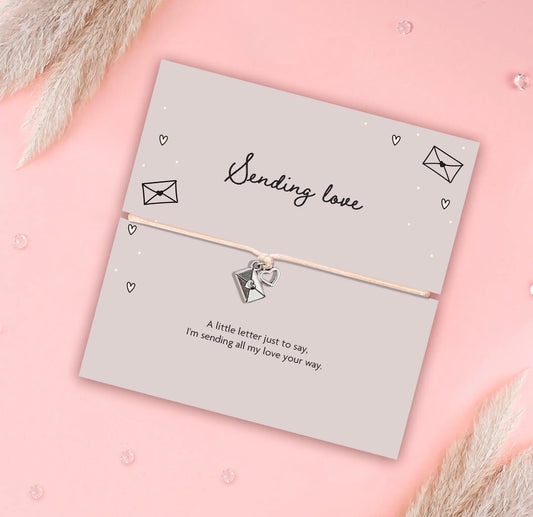 Sending Love Letter and Heart Charm Bracelet on a sentiment card. A sweet gift for friends far away, thinking of you moments and birthdays.