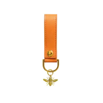Bee leather keyring in orange with gold bee charm.