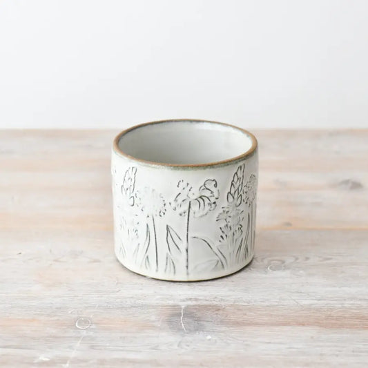Small flower design plant pot, 11cm, with woodland flower pattern.