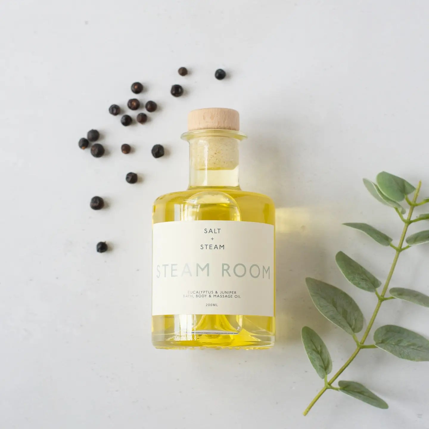 Steam Room eucalyptus bath and body oil 100ml with juniper, ideal for spa experience and skin nourishment.