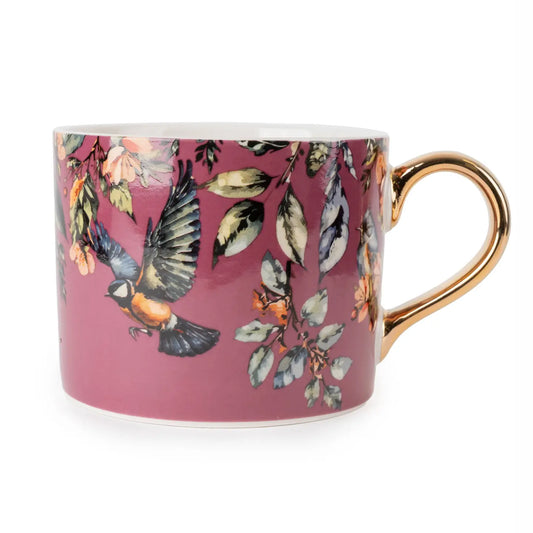 Decorative mug with gold handle and vibrant floral plum design.