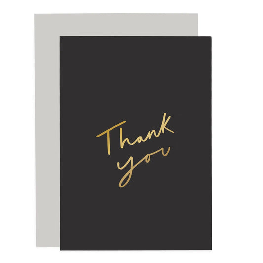 Black thank you sentiments card with gold foiled writing, blank inside for personal message.
