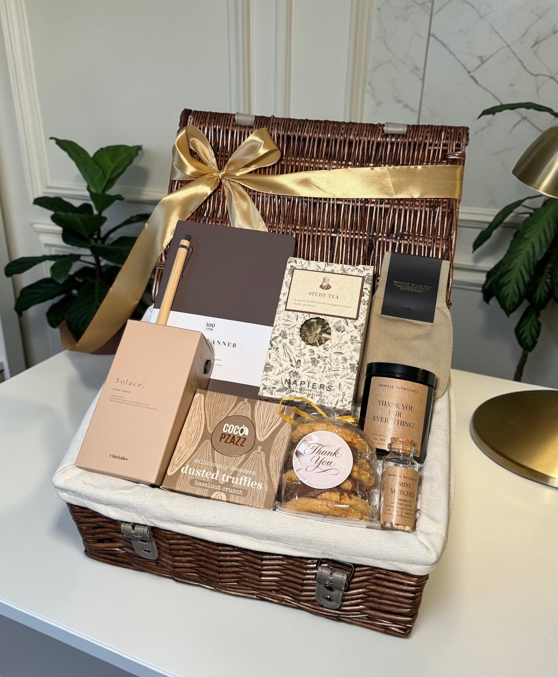 Thank You gift hamper with productivity planner, tea, Peper Harow socks, candle, chocolates, truffles and clay home spray.