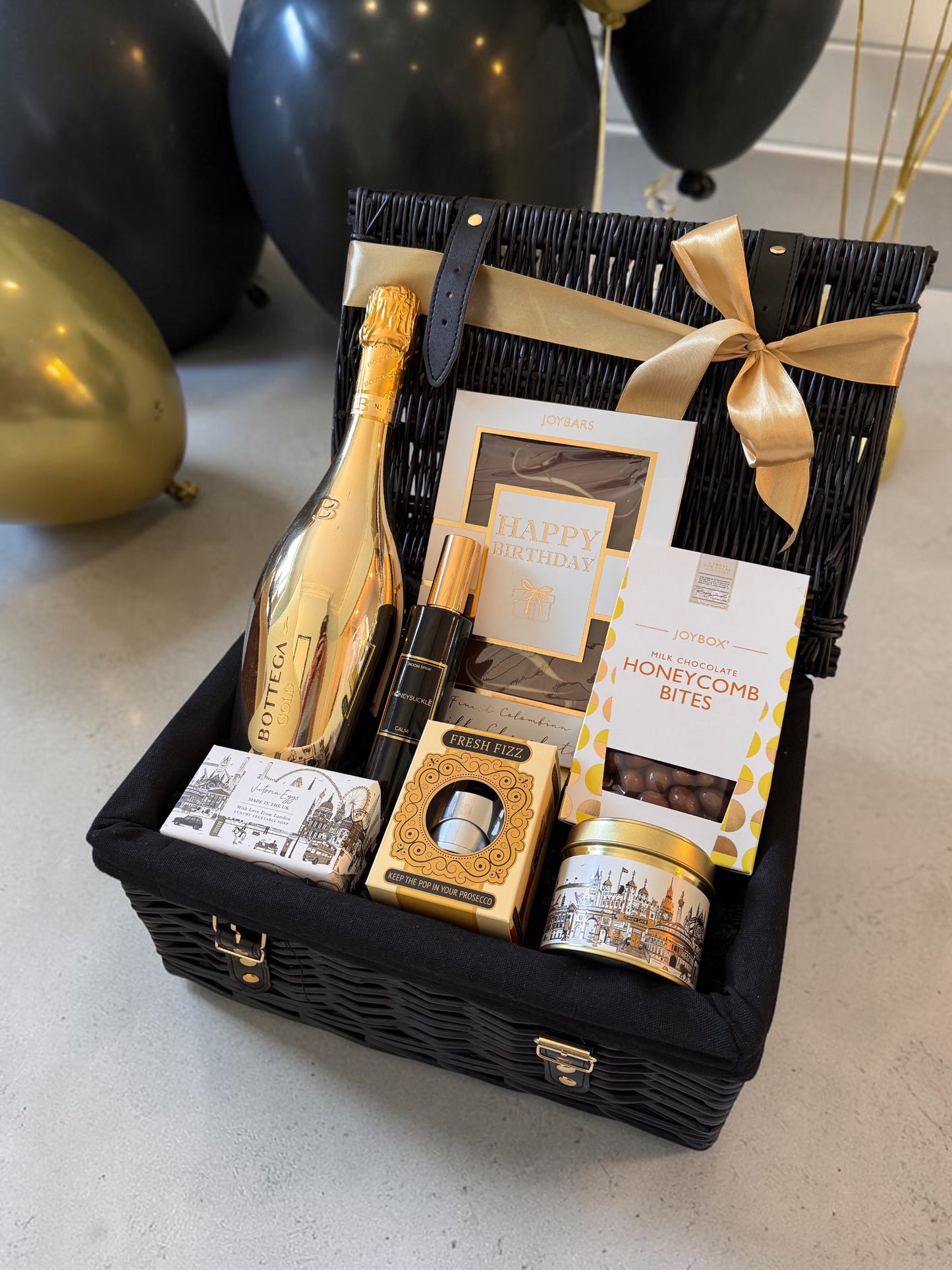 Luxury gold birthday hamper with Prosecco, candle, chocolates and gift accessories