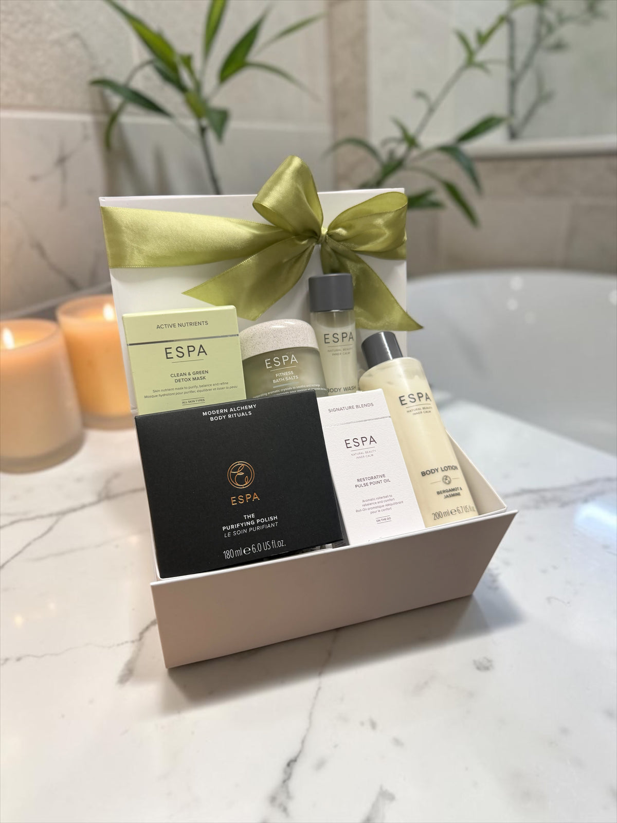 The ESPA Escape Hamper brings a purifying body polish, bath salts, detox mask, pulse point oil, body wash and lotion for a spa day at home.