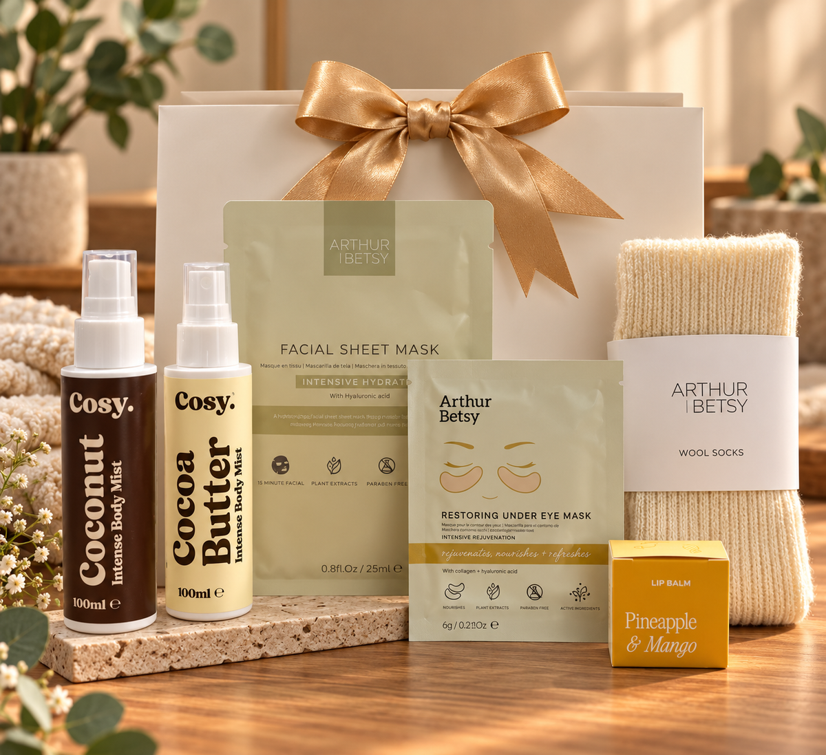 The Sweet Scents and Beauty Gift Bag Set brings coconut and cocoa butter body mists, face and eye masks, wool socks and a lip balm.