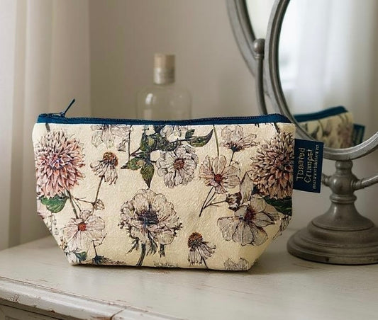 The Blanc Collection Pure makeup bag by Toasted Crumpet – elegant zip pouch with floral design, ideal for daily beauty essentials.