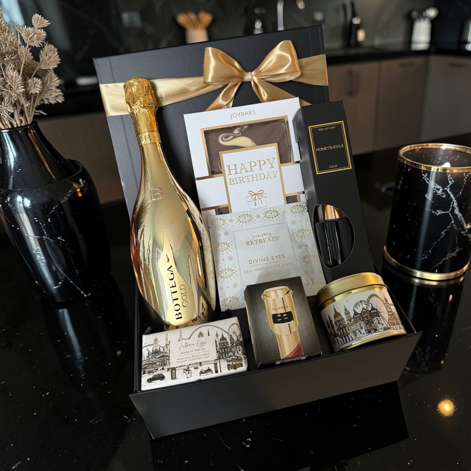 Luxury gold birthday hamper with Bottega Gold Prosecco, birthday chocolate bar, reed diffuser, candle, eye mask