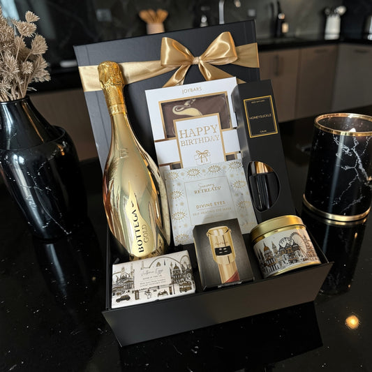 Luxury gold birthday hamper with Bottega Gold Prosecco, birthday chocolate bar, reed diffuser, candle, eye mask