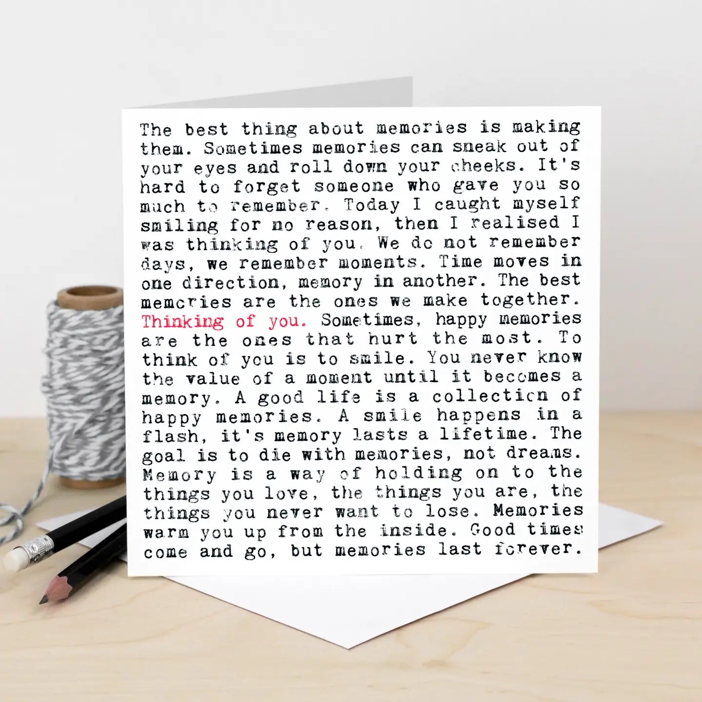 Thinking of You Quotes Card with distressed typewriter font, blank inside, on textured matt paper.