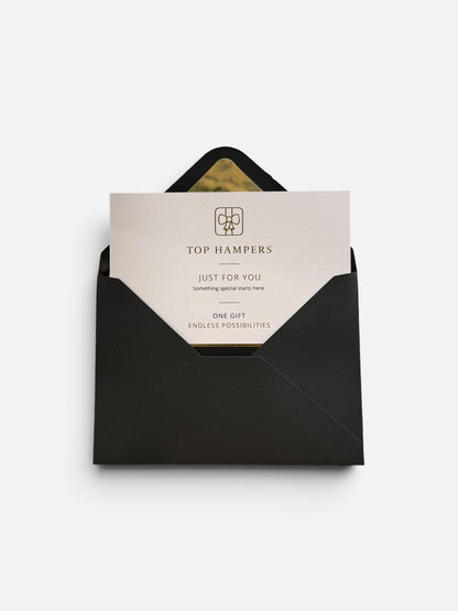 A black envelope with a white gift card partially pulled out, featuring the TOP HAMPERS logo and the words 'JUST FOR YOU' and 'ONE GIFT ENDLESS POSSIBILITIES' on a clean white background.