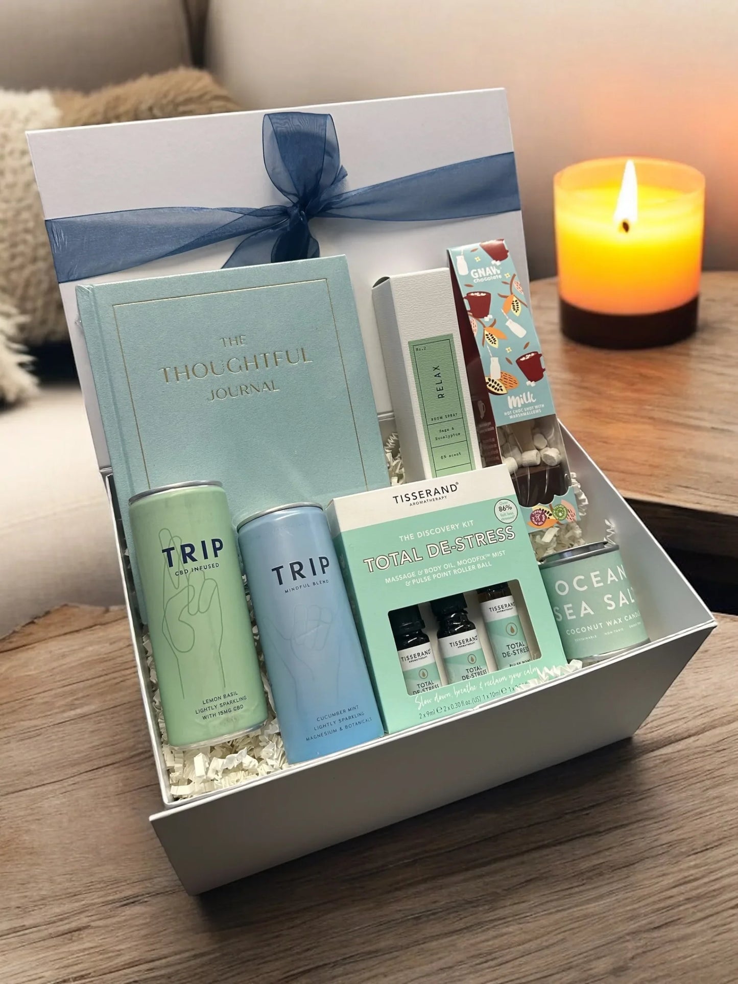 Gift box with wellness products and a journal for Tranquility & Wellness.