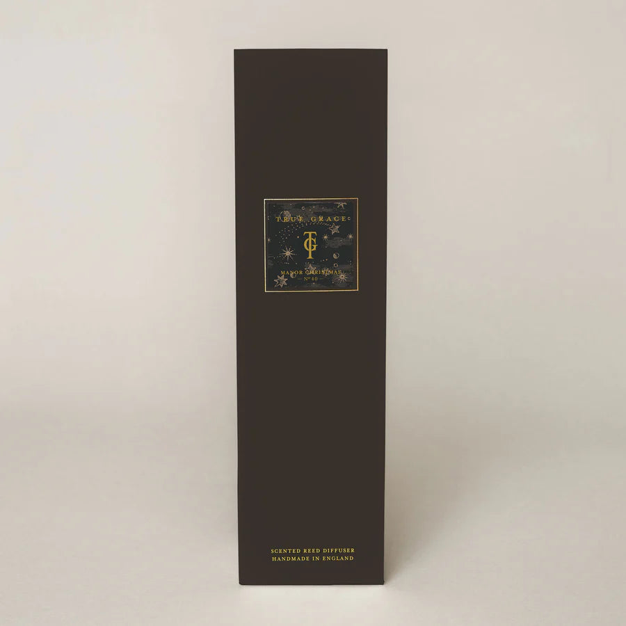 True Grace Manor Christmas 200ml Room Diffuser Set with smoked-glass bottle, black reeds, and rich festive fragrance for a timeless holiday aroma.