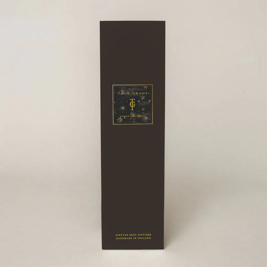 True Grace Manor Christmas 200ml Room Diffuser Set with smoked-glass bottle, black reeds, and rich festive fragrance for a timeless holiday aroma.