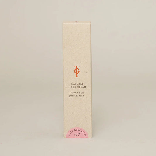 Rose natural hand cream in beige packaging.