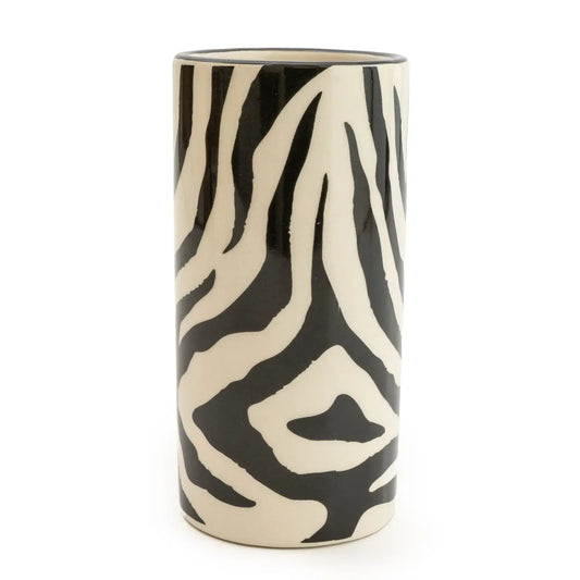 Tumbler with zebra print design, stylish bathroom accessory.